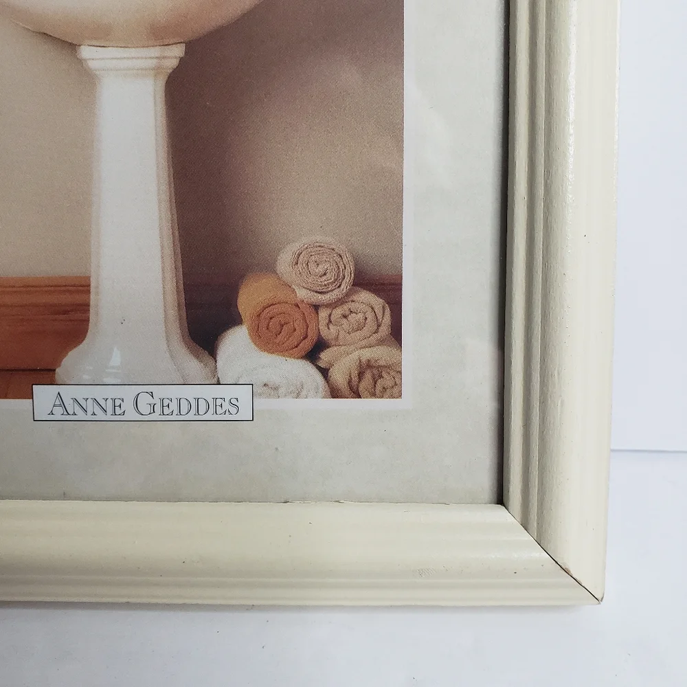 Framed print of Anne Geddes' 